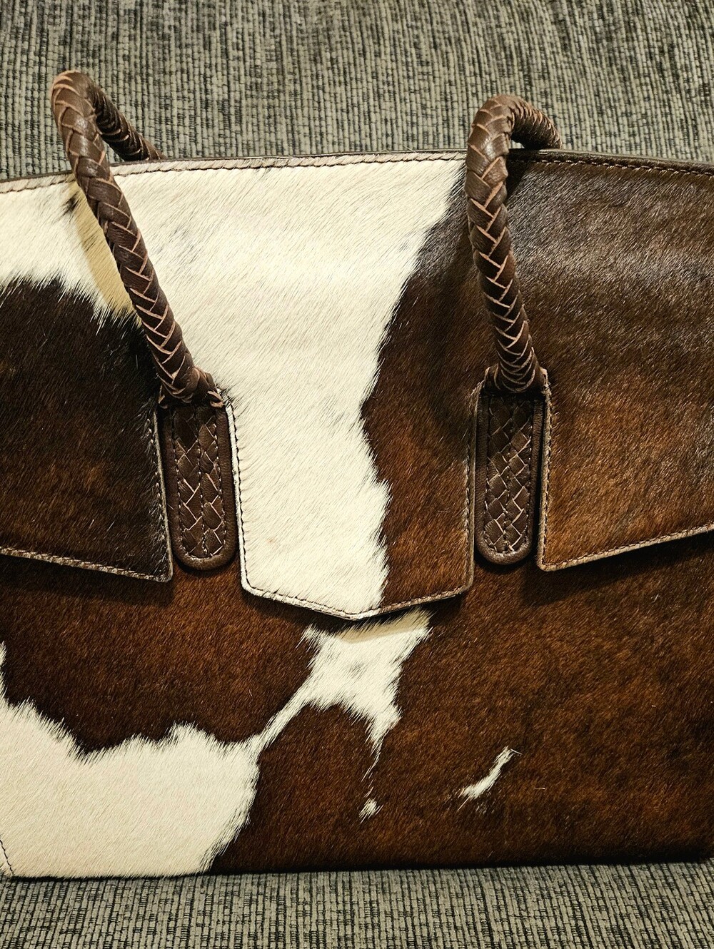 Brown and White Cowhide Tote with Braided Handles